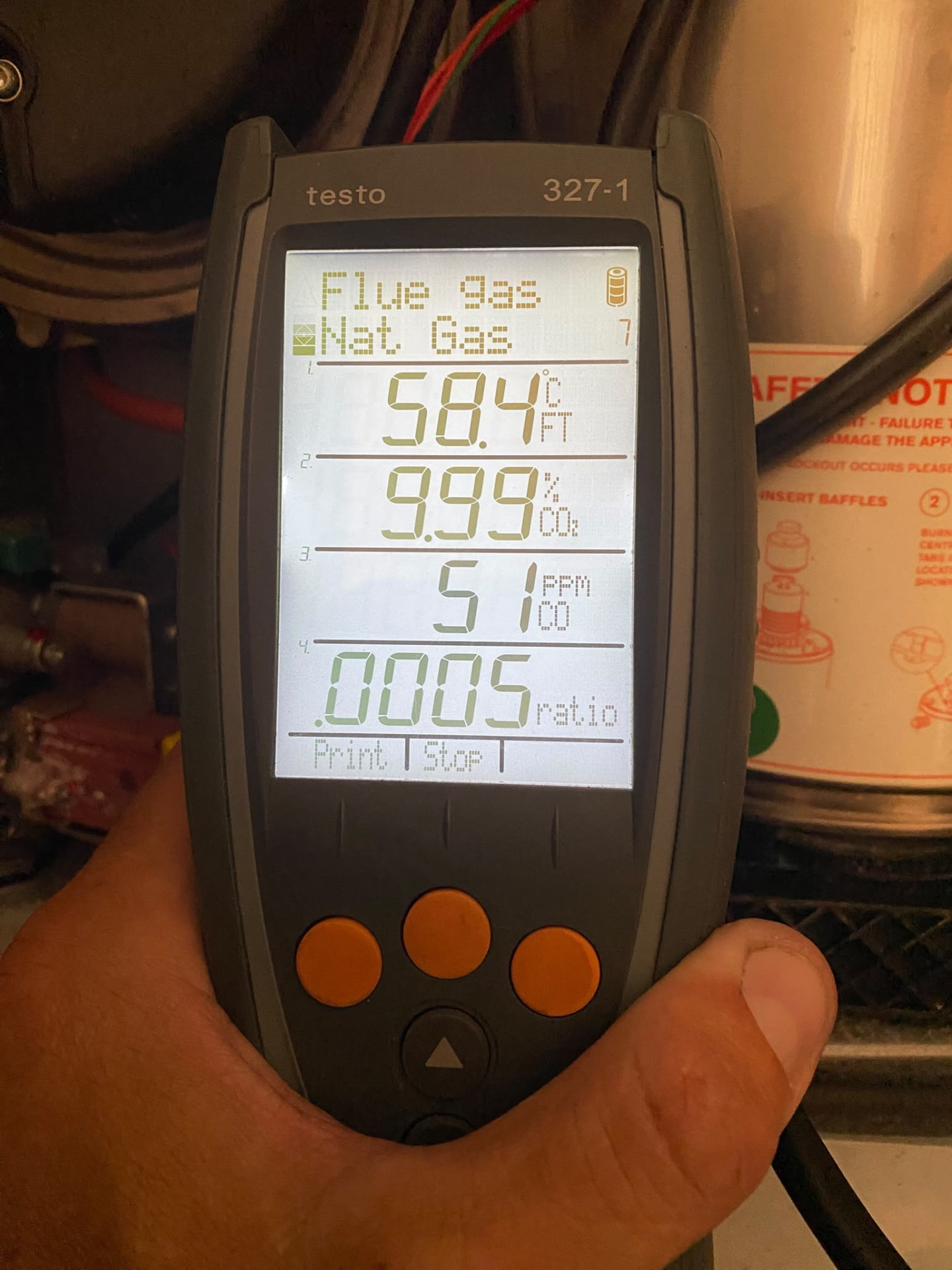 Testo flue gas analyser reading during a London annual boiler service