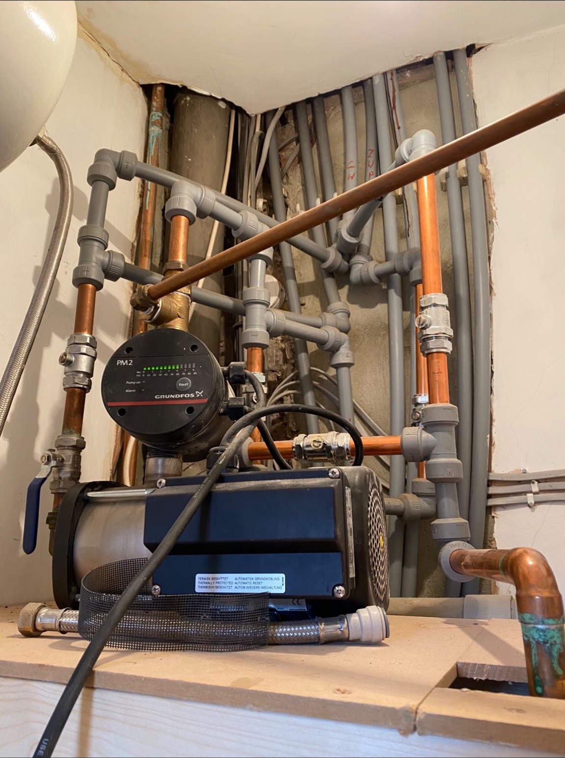 Grundfos cold water booster pump installed with copper pipework in London