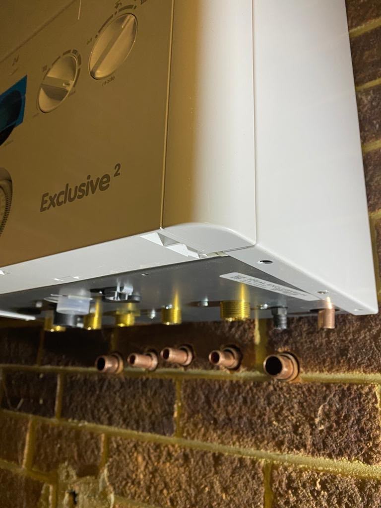 Ideal Exclusive 2 combi boiler installation with brass service valves in London